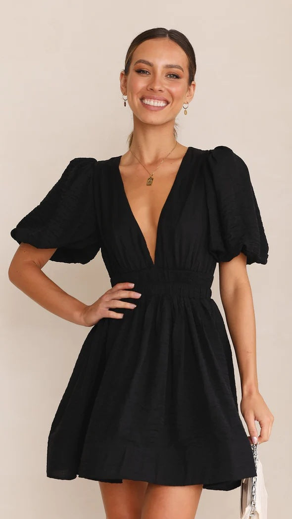Floral mini dress with puff sleeves, flattering fitted silhouette, women's spring daytime style
