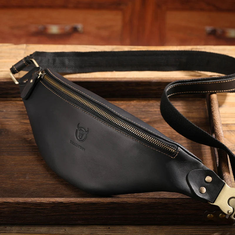 Men's slim premium leather belt bag with secure zipper closure and subtle debossed logo detail