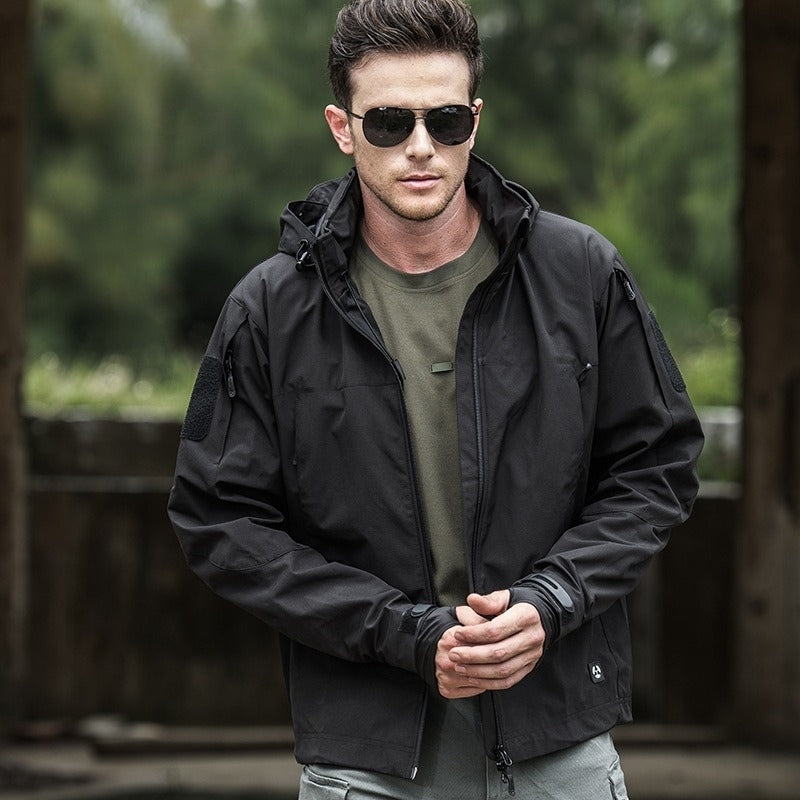 Men's dark softshell jacket tailored fit wind-resistant hood with multiple zipper pockets streamlined style