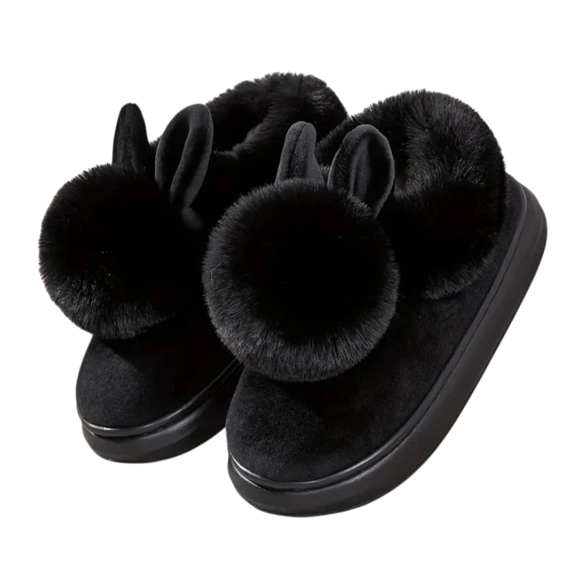 Women's plush slip-on slippers in cozy fleece with playful bunny ear fur trim for home warmth