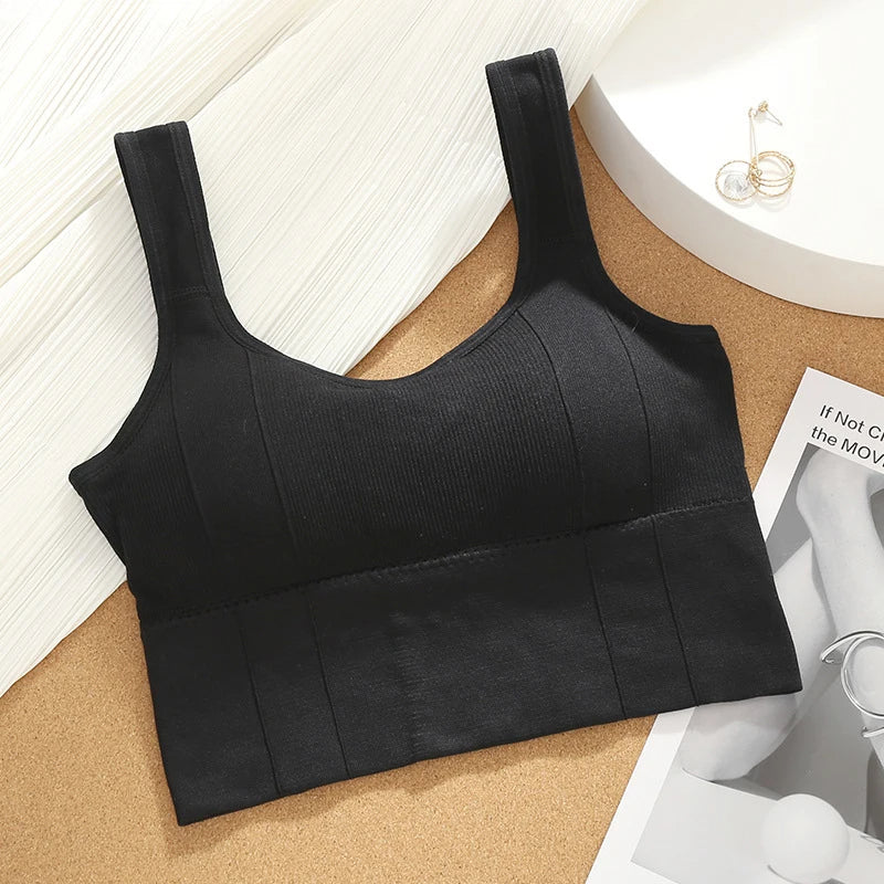 Black seamless ribbed longline sports bra with sculpted fit, full coverage, and zero ride-up design