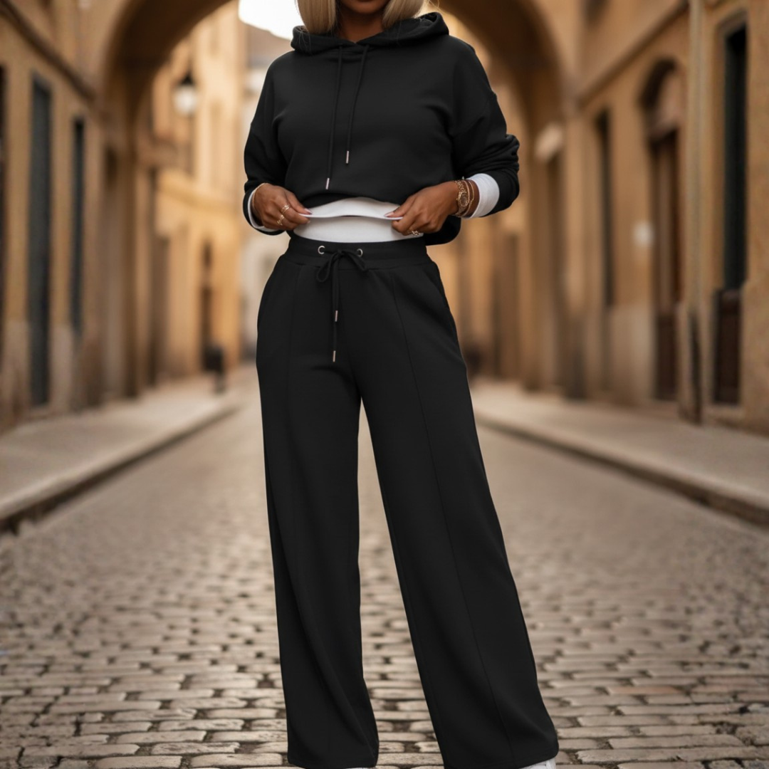 Women's two-piece hoodie and wide-leg pants set in soft fabric, relaxed regular fit for travel