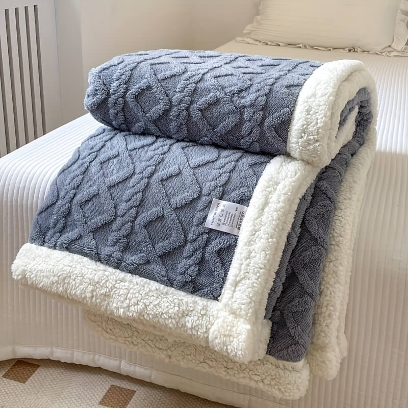 Ivory sherpa throw blanket with diamond texture, dual-sided fleece design for cozy modern home decor