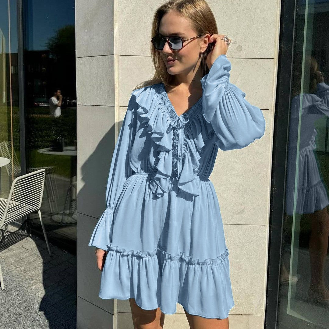 Women's elegant black V-neck A-line dress with long sleeves and delicate ruffle details
