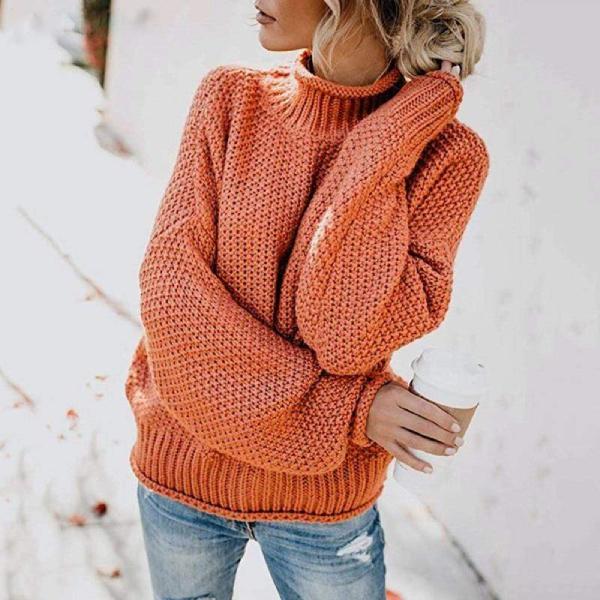 Women's loose fit knitted sweater with thick ribbed neckline and dropped shoulders for easy layering