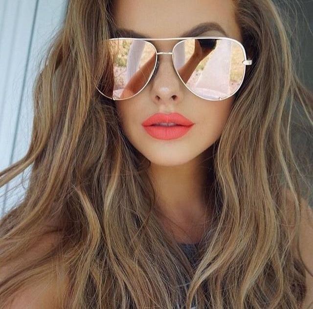 Women's aviator sunglasses with mirrored lenses in rose gold, black, pink, gold, and silver frames