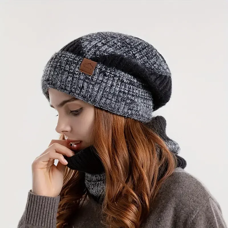 Women's burgundy knit beanie and scarf two-piece set with ribbed texture for elegant winter layering