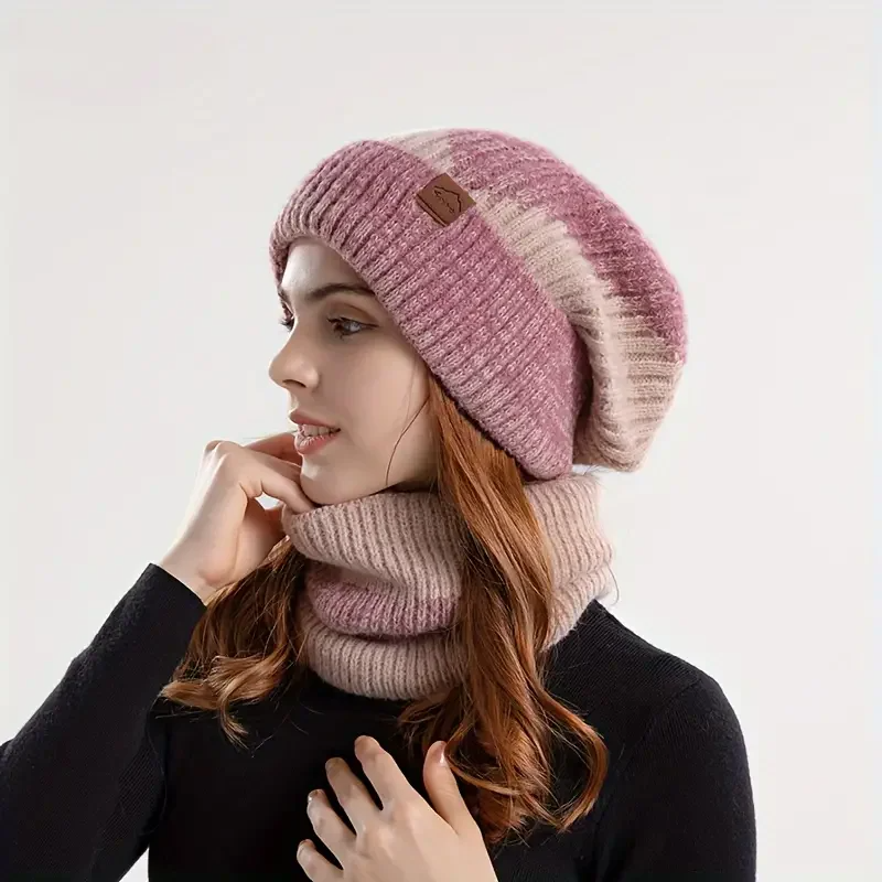 Women's knit beanie and scarf two-piece set in cozy ribbed texture for elegant cold-weather layering