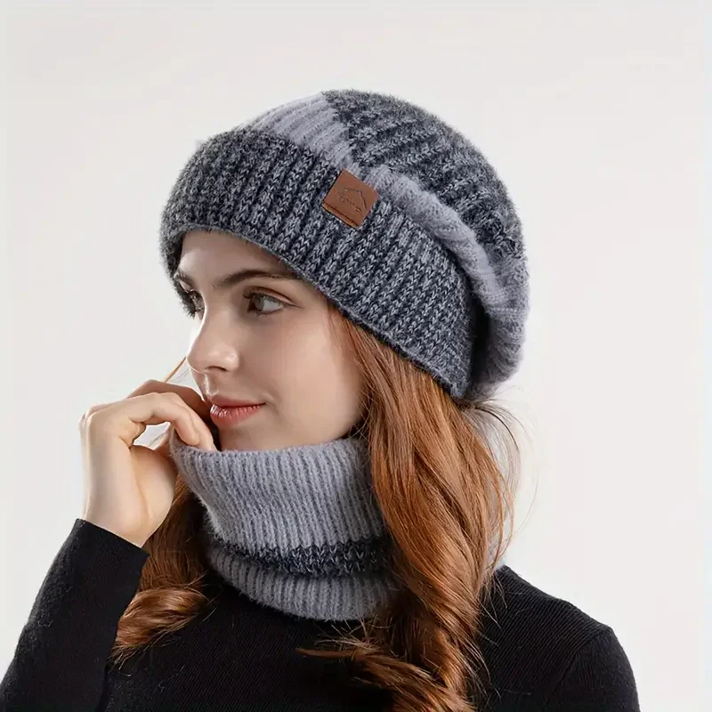 Women's knit beanie and scarf two-piece set in cozy ribbed texture for elegant cold-weather layering