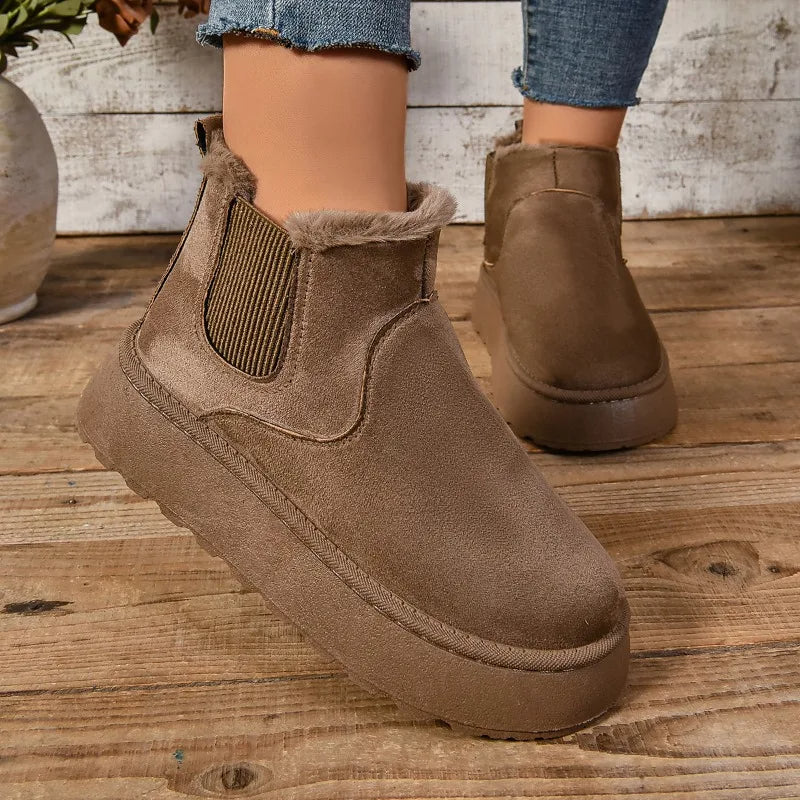 Women's black plush platform boots with faux fur lining, chunky sole, slip-on winter style