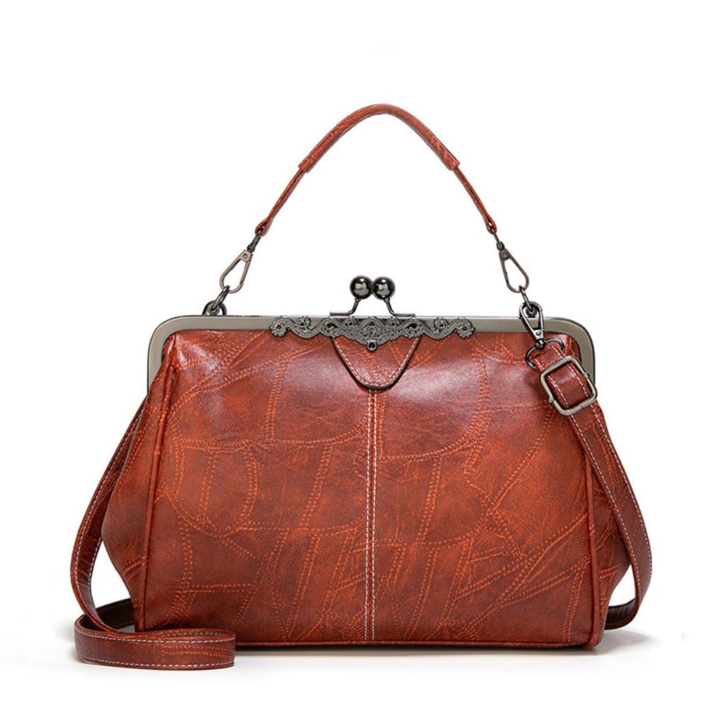 Jacqueline structured faux leather handbag in neutral tone with vintage clasp closure and adjustable strap