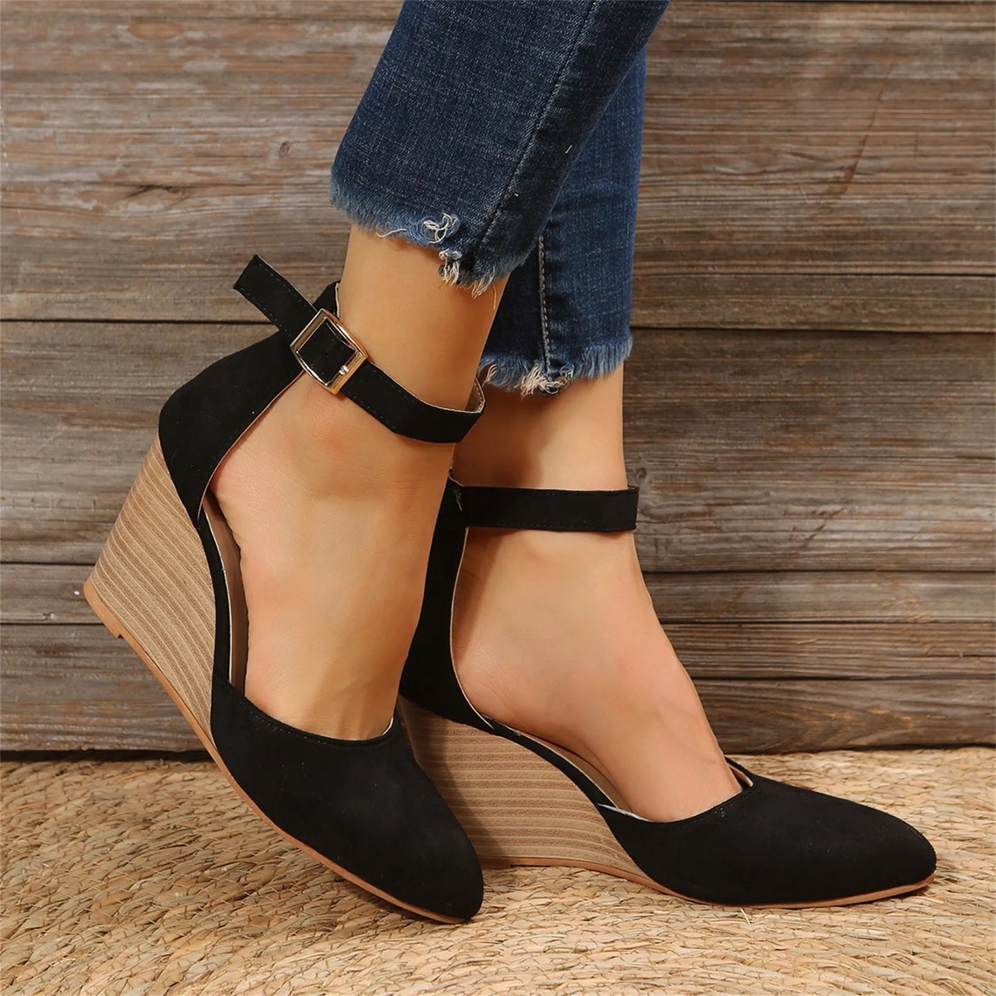 Women's suede wedge heel closed-toe pump with ankle strap and sculpted wood-grain wedge sole
