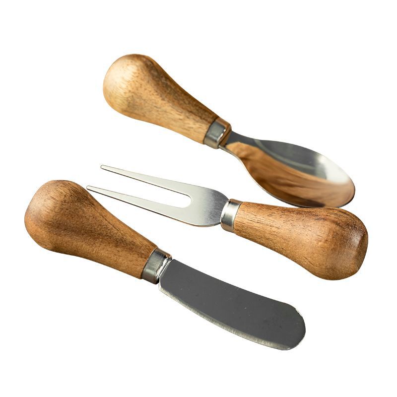 Minimalist stainless steel butter knife wooden handle sleek blade effortless spread home kitchen