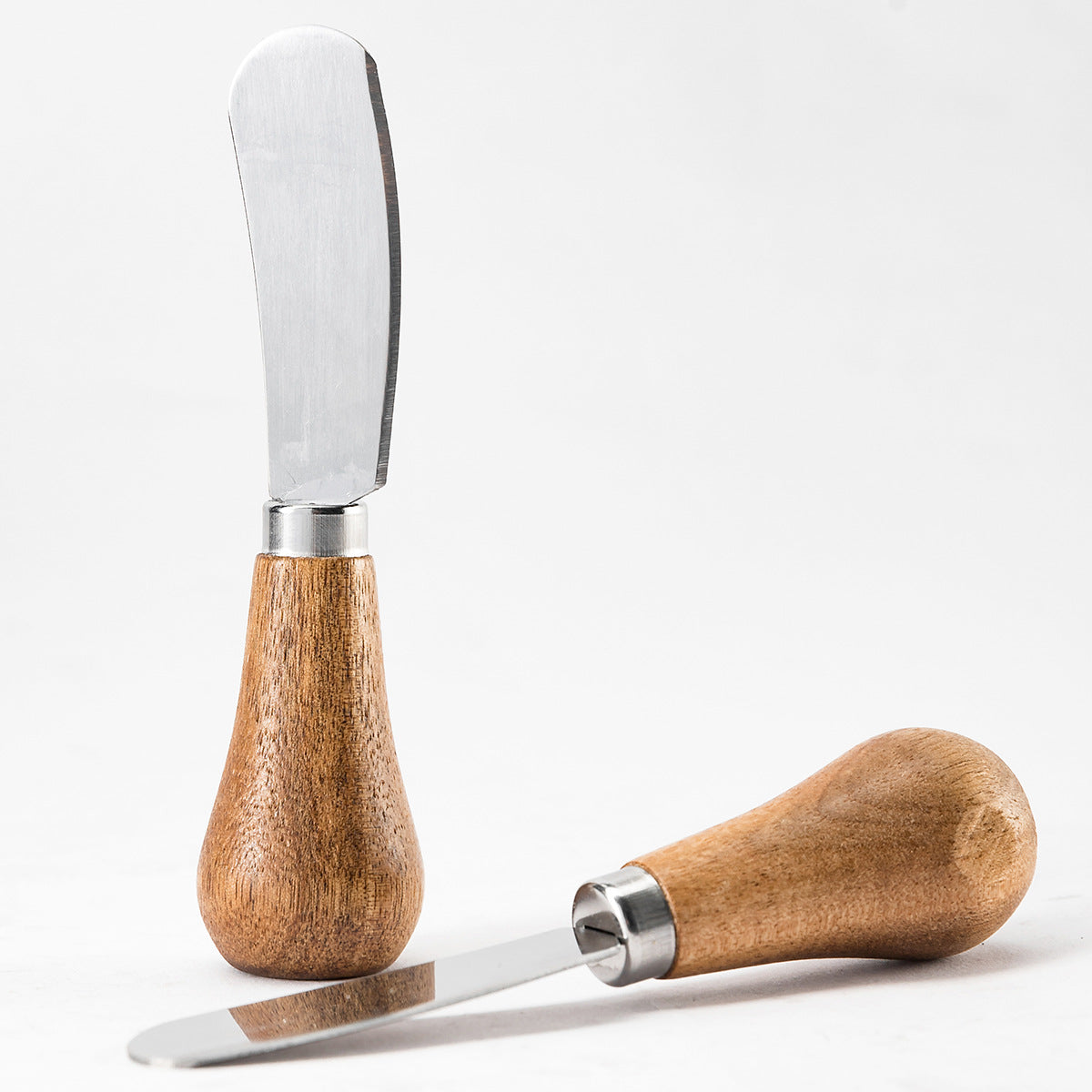 Minimalist stainless steel butter knife wooden handle, sleek blade for effortless spreading home cooks