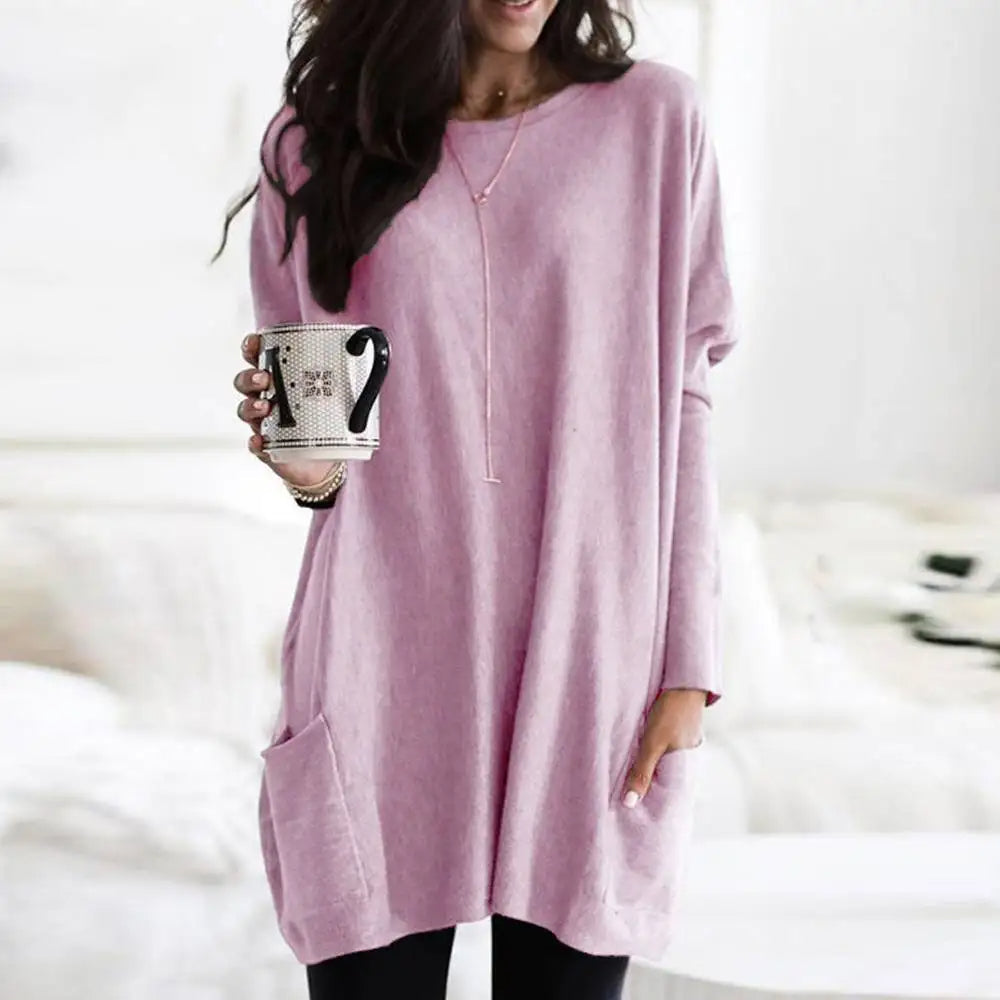 Women's oversized crew neck sweater in soft cotton blend knit with functional front pockets