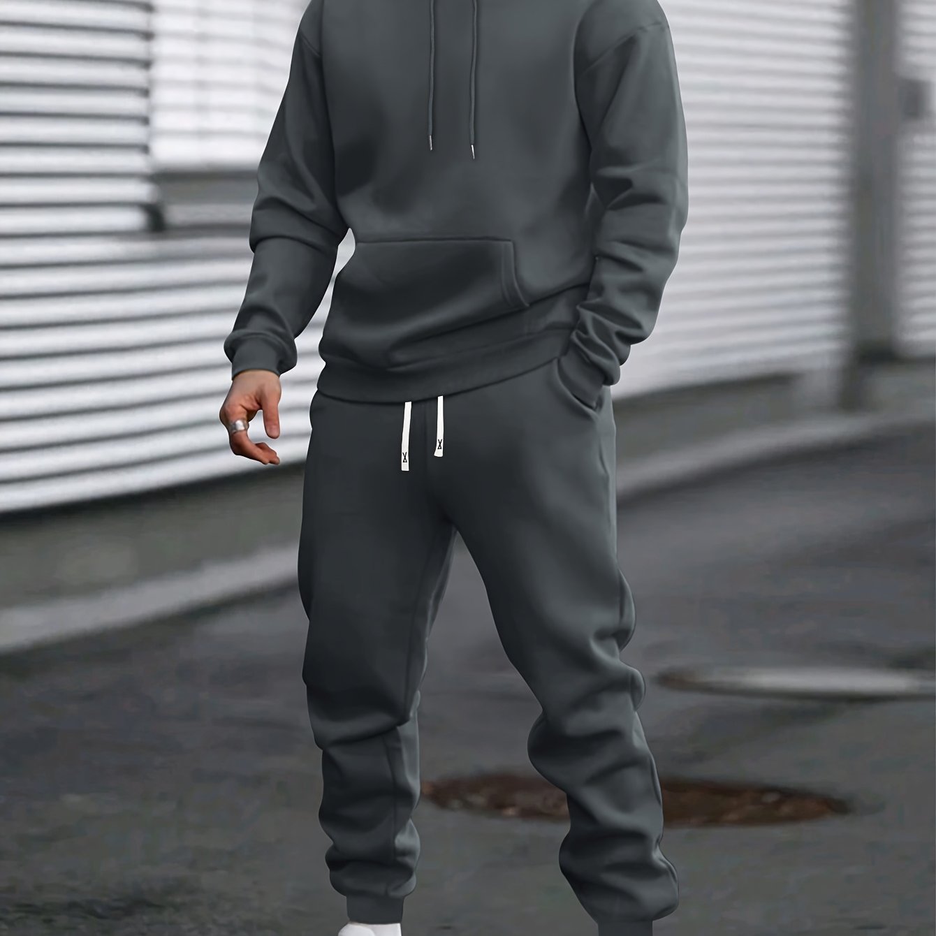 Men's gray pullover hoodie and jogger tracksuit set with drawstring hood for casual everyday wear