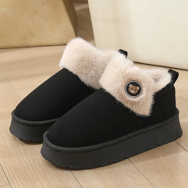 Women's ankle-high slip-on slipper boots with plush fleece interior, faux fur trim, and button details