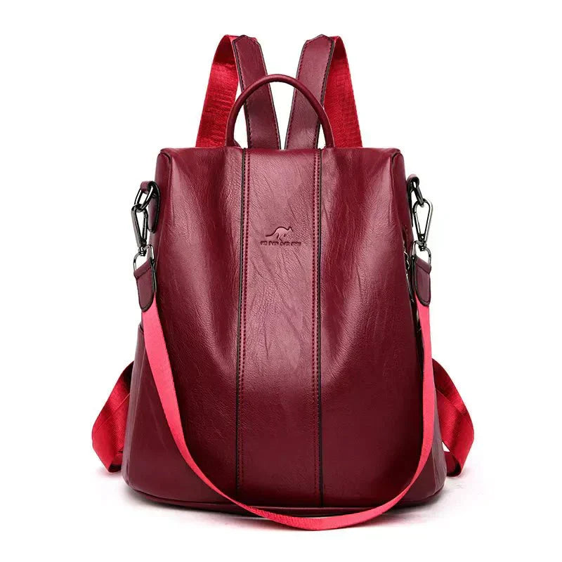 Black vegan leather convertible backpack for women, sleek 3-in-1 design with top handles