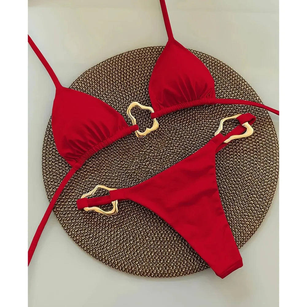 Women's triangle bikini set gold ring accents high-cut bottoms body contouring adjustable ties