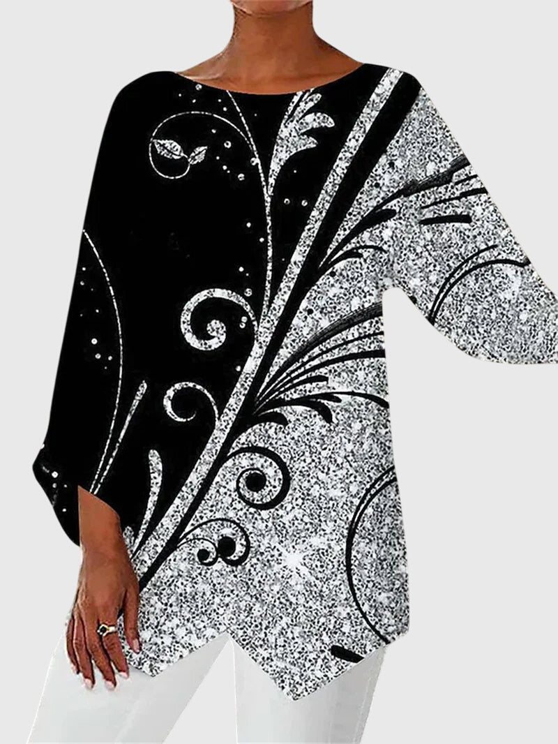 Women's flowing blouse with sparkle detail accents in a modern silhouette for radiant everyday style