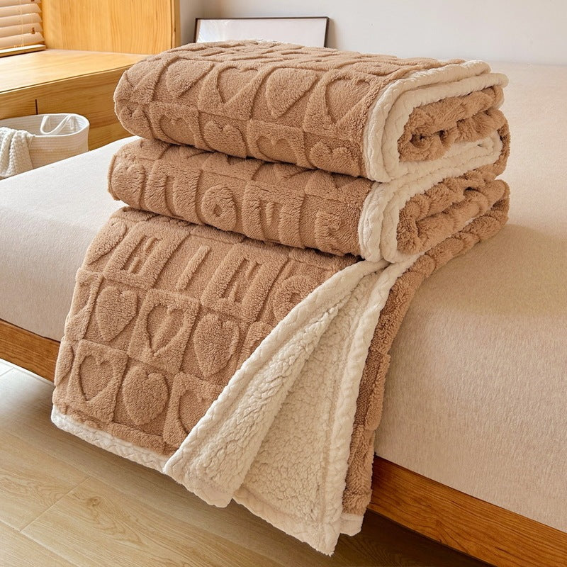 Soft blue embossed heart pattern sherpa blanket reversible plush design for cozy living spaces