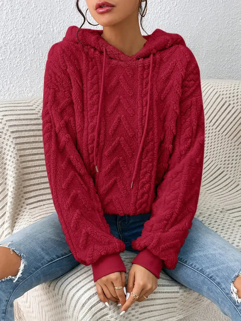 Women's oversized plush knit pullover hoodie in cozy fleece with cable-knit texture for loungewear