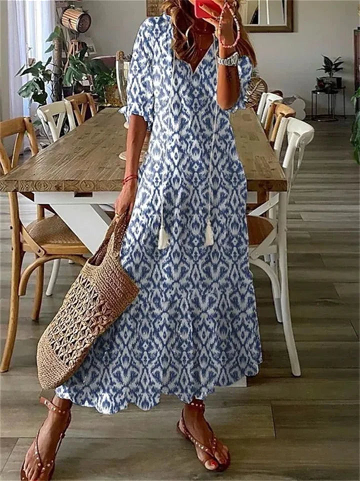 Women's floral maxi dress boho chic relaxed silhouette V-neck tassel ties elbow sleeves airy fabric