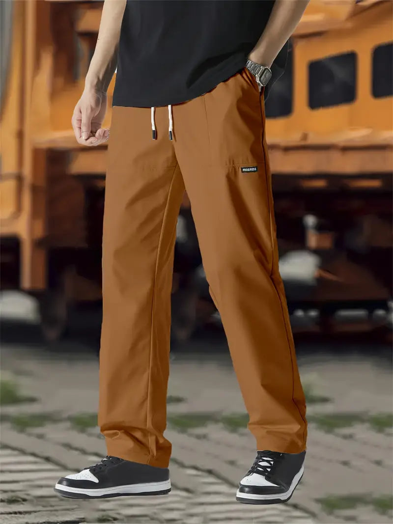 Men's relaxed fit waistline pants with adjustable waist for casual and active comfort