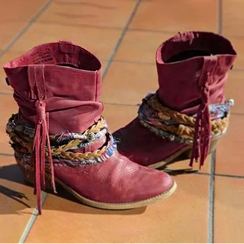 Women's vintage western ankle boots with braided tassel detail, block heel, and brown PU leather upper