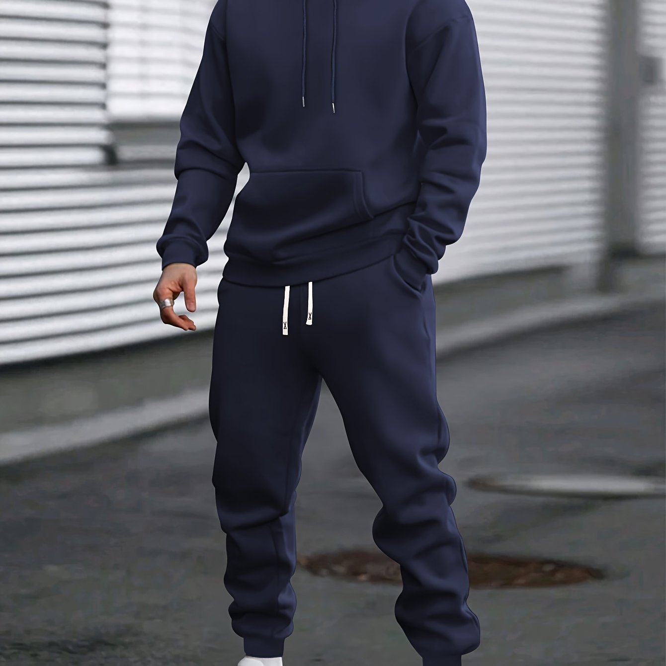 Men's grey pullover hoodie and jogger tracksuit set with drawstring hood for easy casual fit