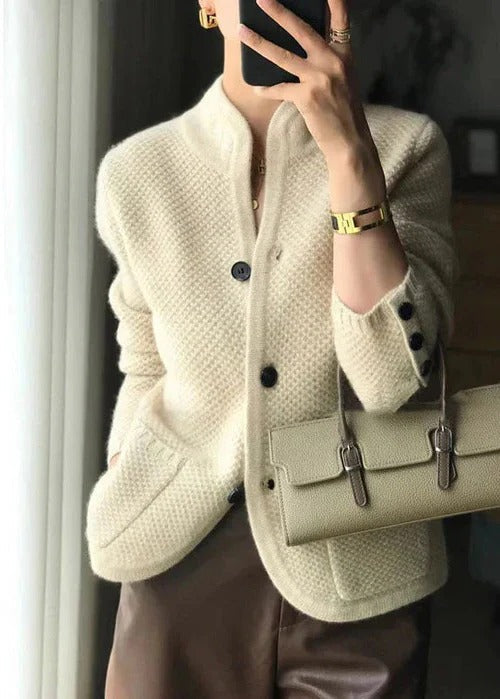 Beige open-front knit cardigan relaxed silhouette soft fabric cozy layering essential