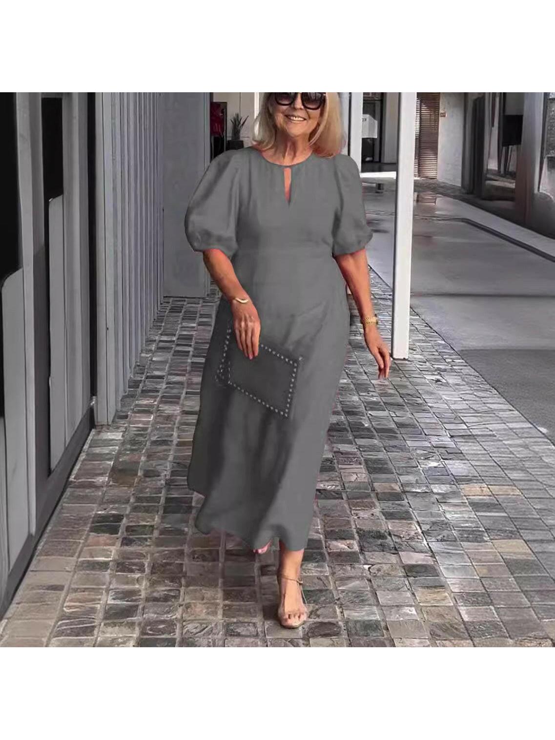 Carla elegant midi dress with chic puff sleeves in timeless formal style for modern women