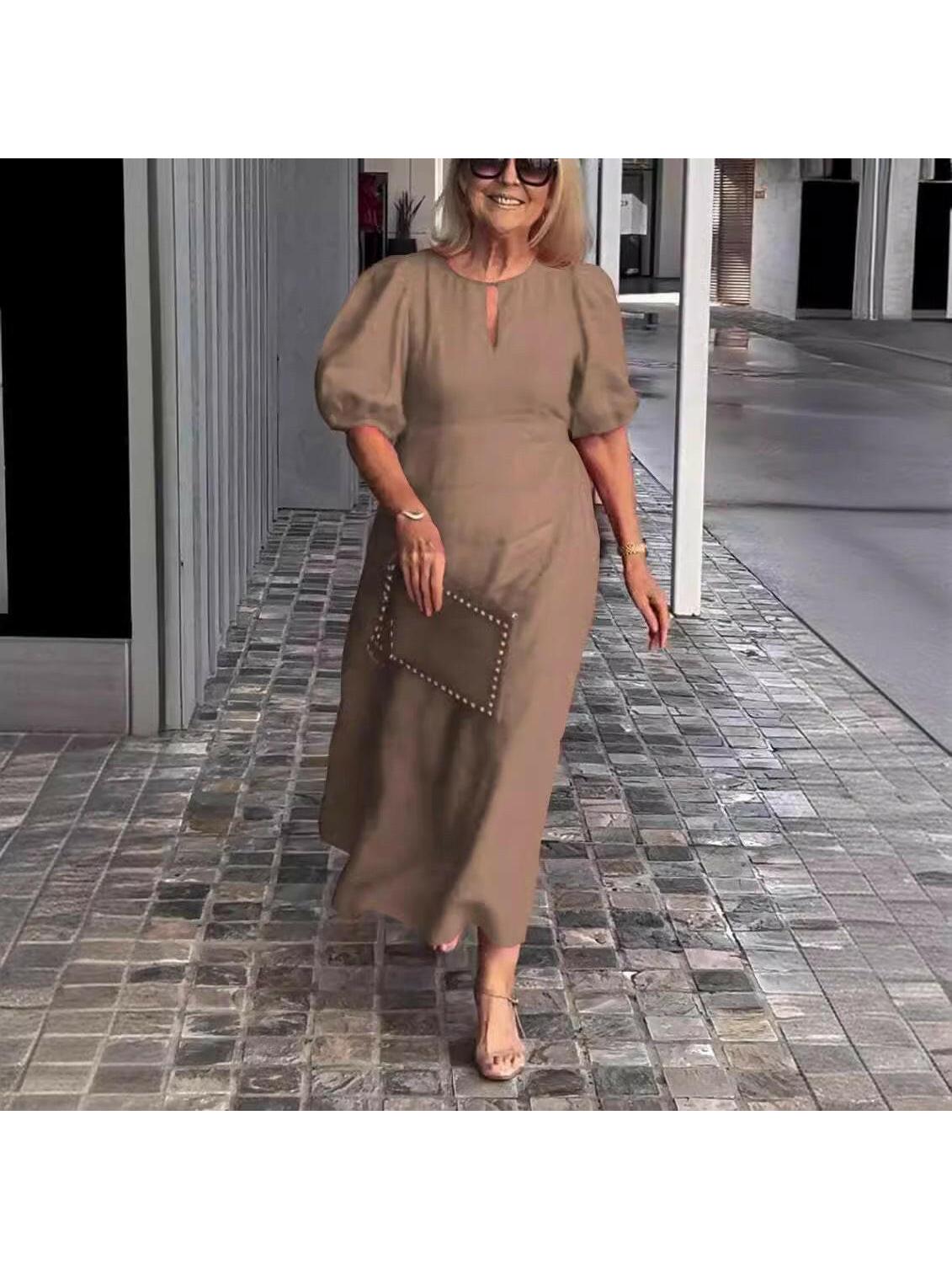 Carla elegant midi dress with chic puff sleeves, timeless formal style for modern women