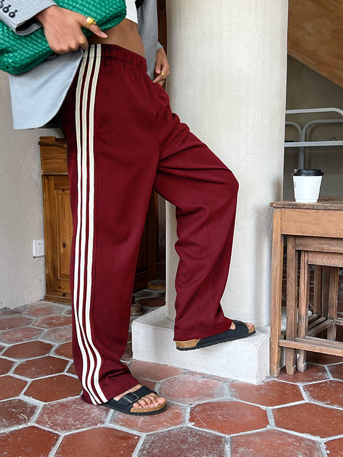 Women's striped patchwork high-waist sweatpants in casual colorblock design with soft cotton blend