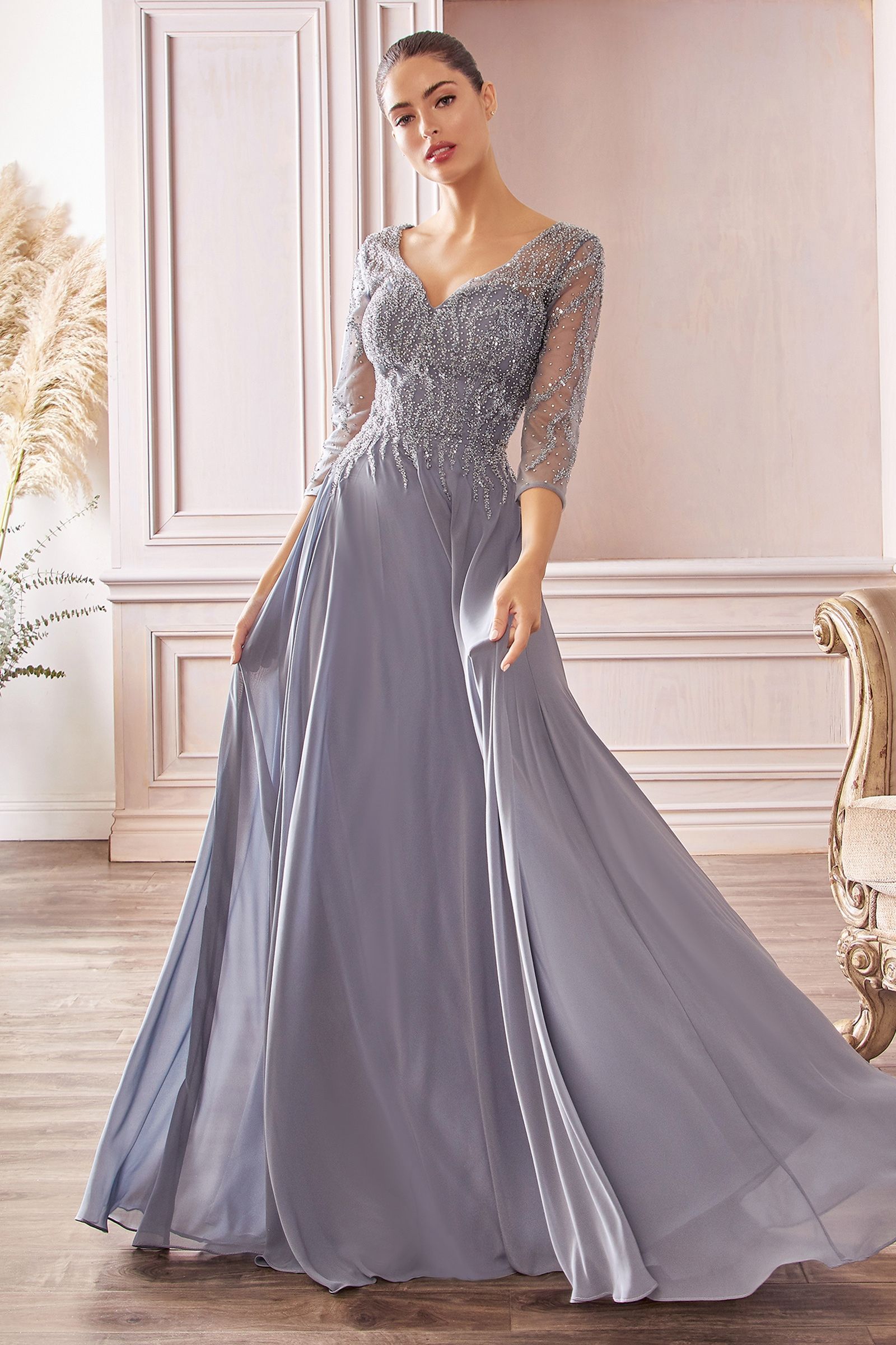 Royal blue A-line evening gown beaded bodice sheer three-quarter sleeves flowing chiffon skirt