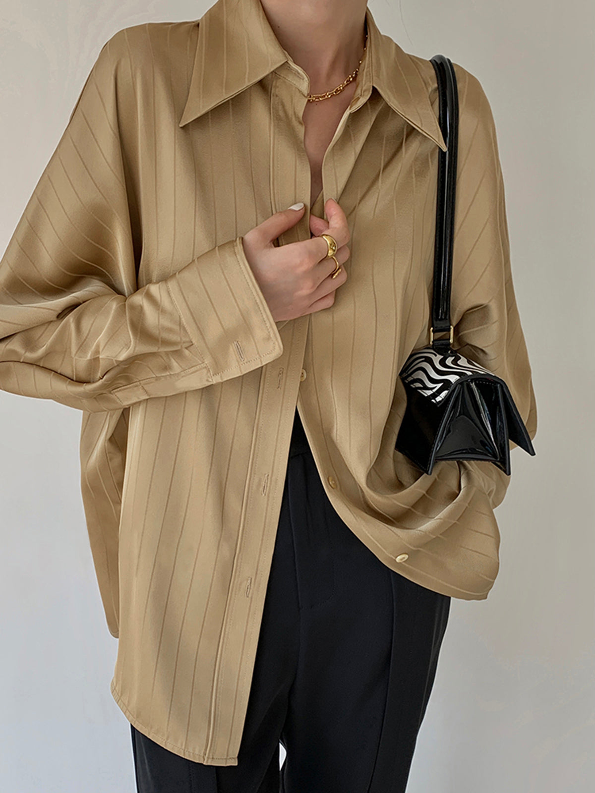 Women's oversized button-up collared shirt elegant smart casual wrinkle-resistant fluid drape versatile top