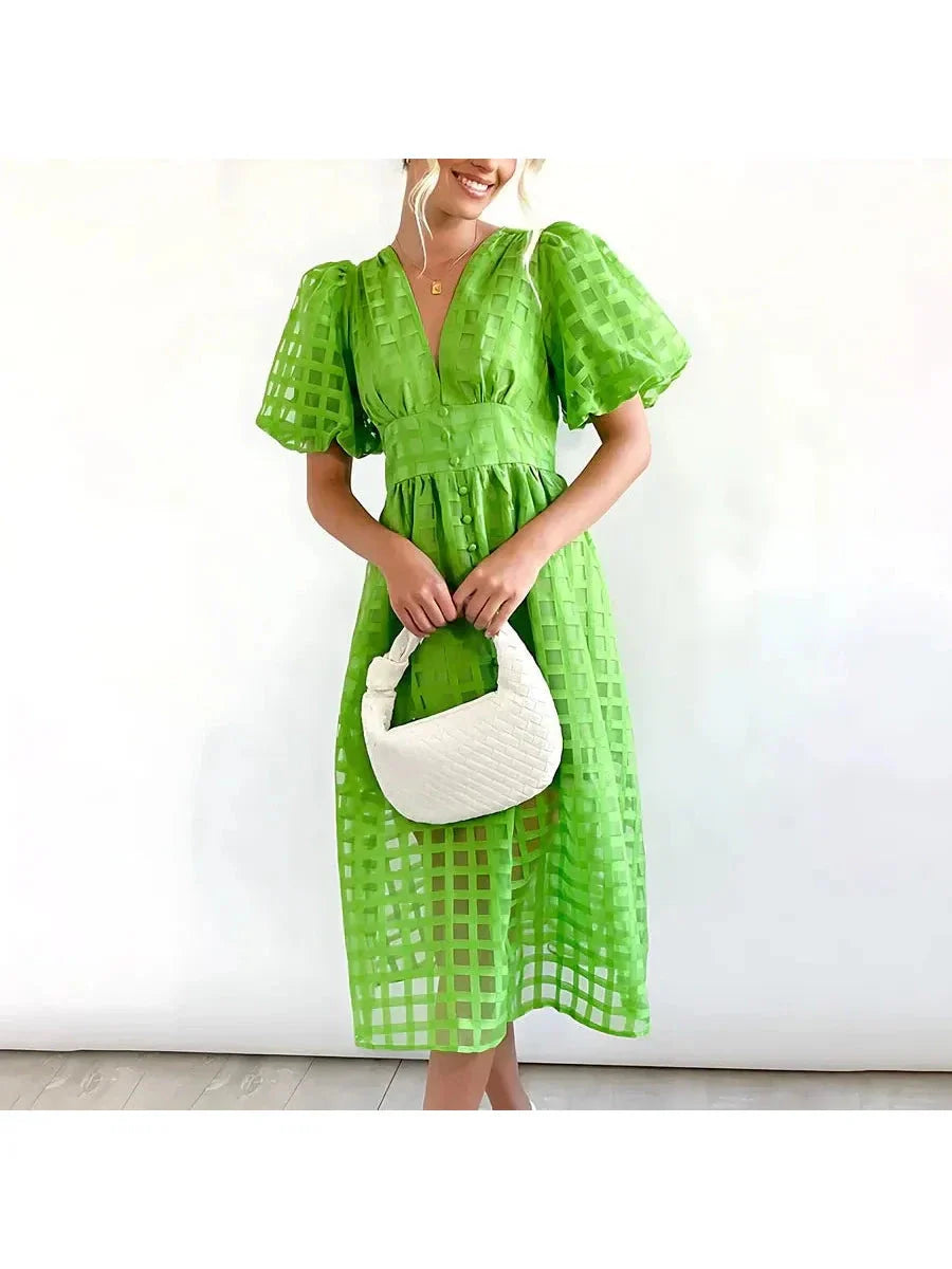 Floral patterned midi dress with puff sleeves, vintage-inspired silhouette, timeless chic style for women
