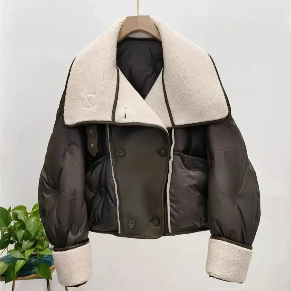 Women's double-breasted aviator puffer jacket with 90% white duck down insulation, sleek polished finish
