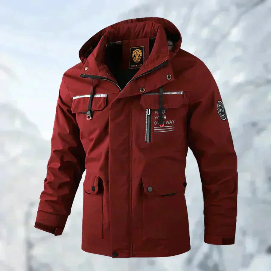 Men's windproof waterproof outdoor jacket in neutral tone, slim-fit adventure style with weather-sealed construction