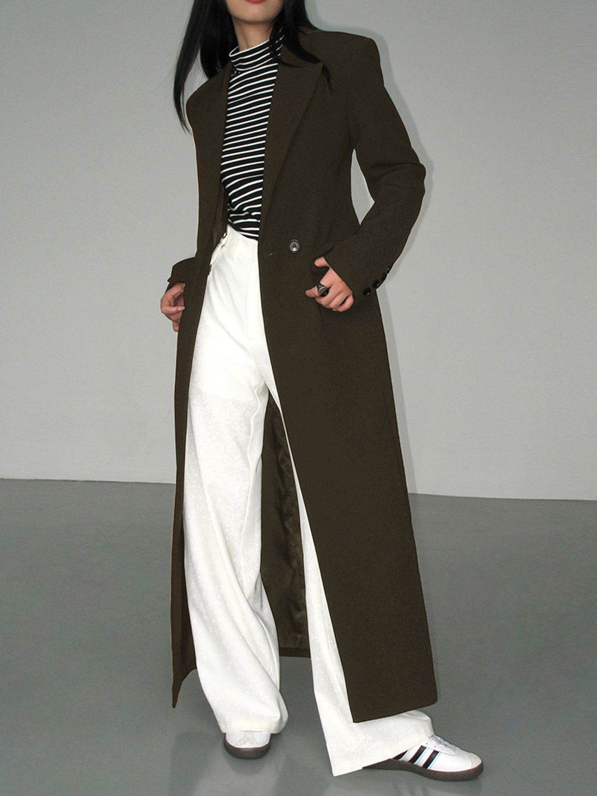 Women's longline blazer coat structured silhouette collar detail versatile professional style subtle stretch fabric