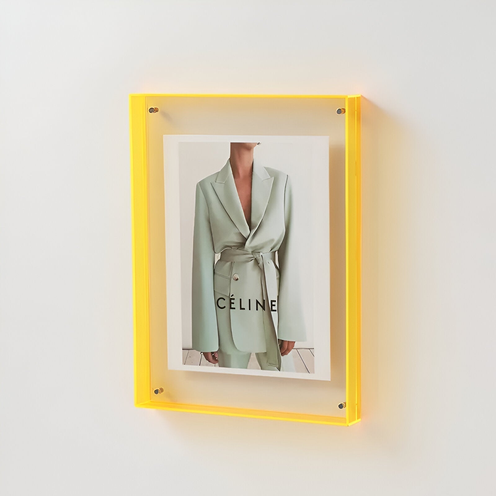 Clear acrylic floating picture frame with vibrant colored edges for modern minimalist home decor