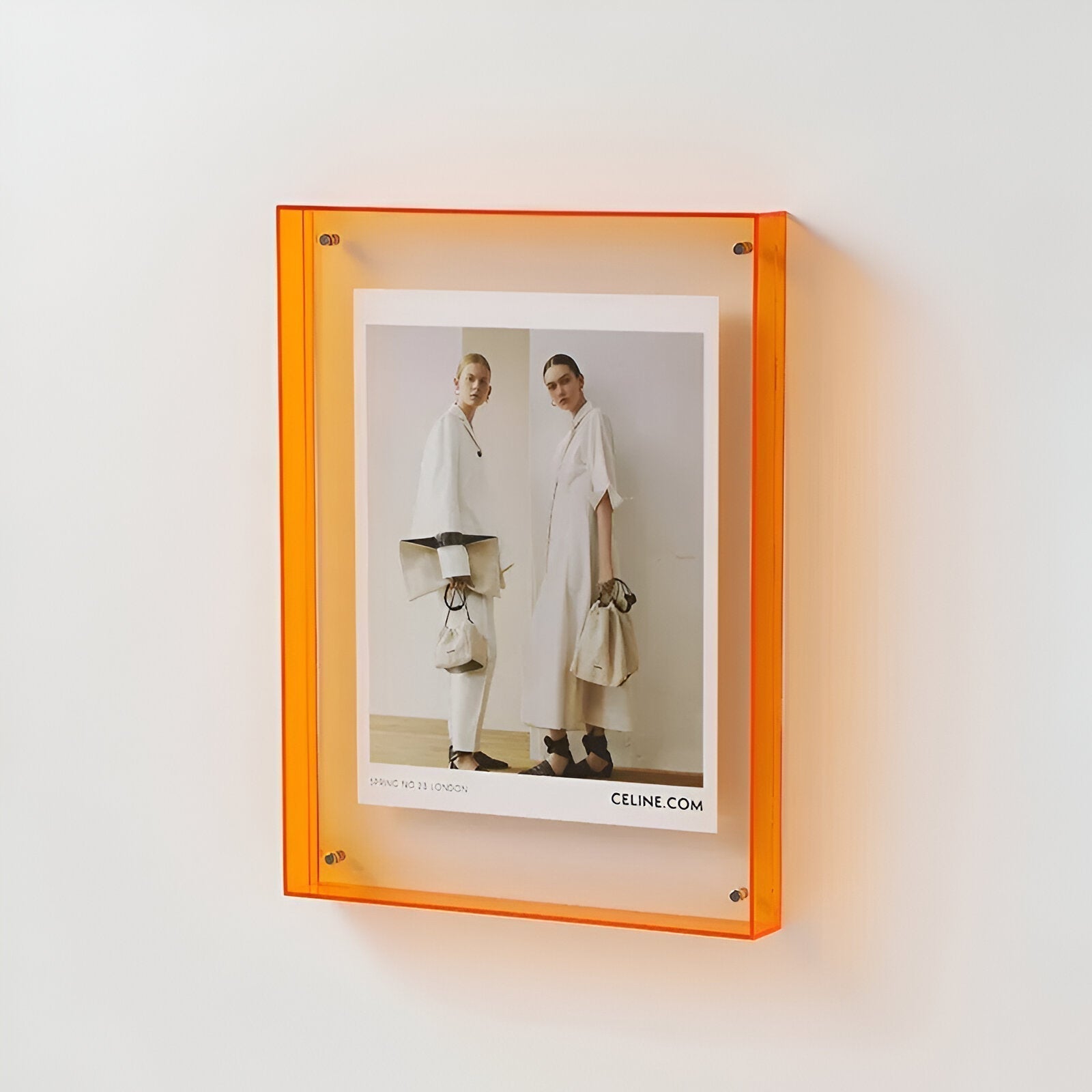 Transparent acrylic floating picture frame with vibrant colored edges for modern home decor