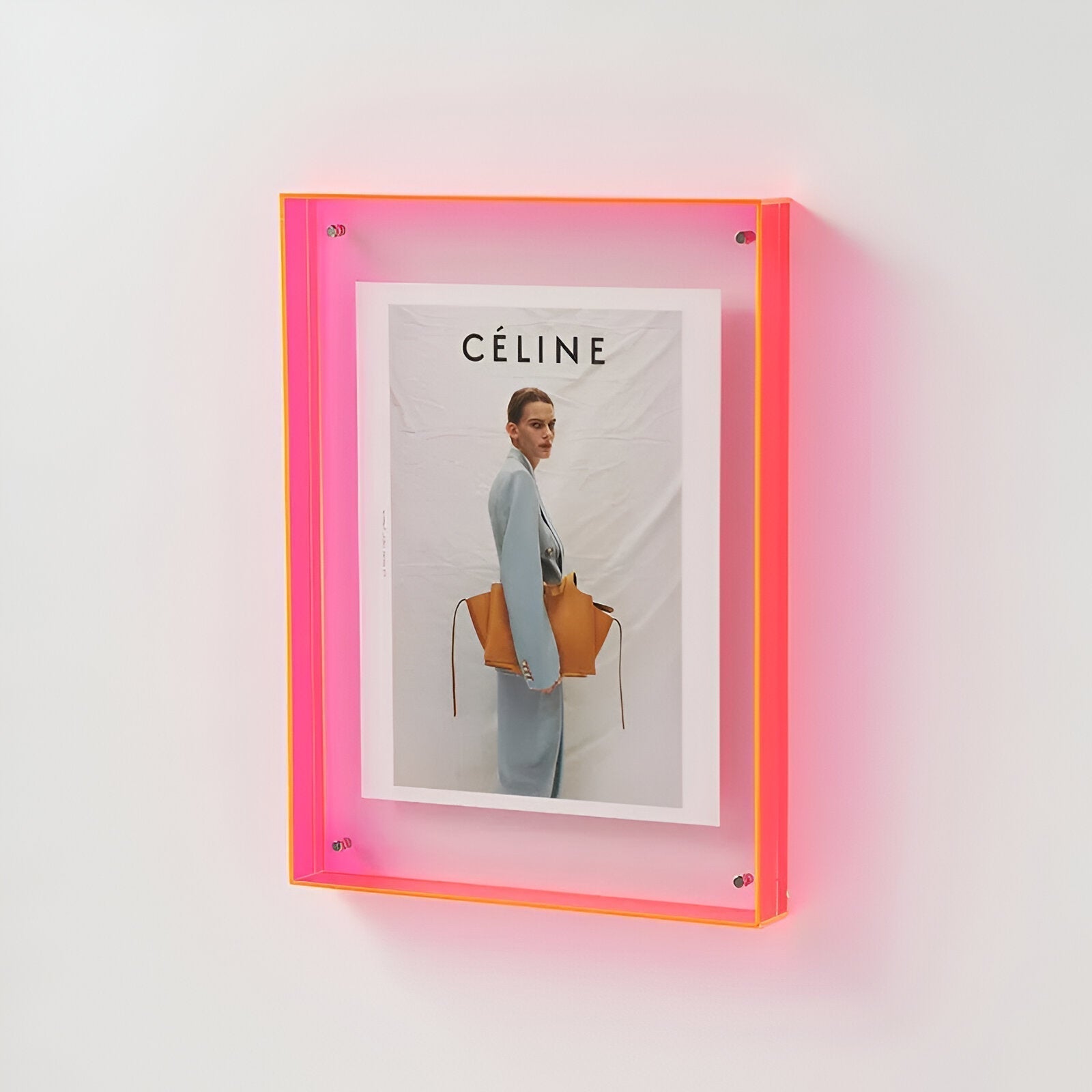 Clear acrylic floating picture frame with vibrant colored edges for modern minimalist home decor
