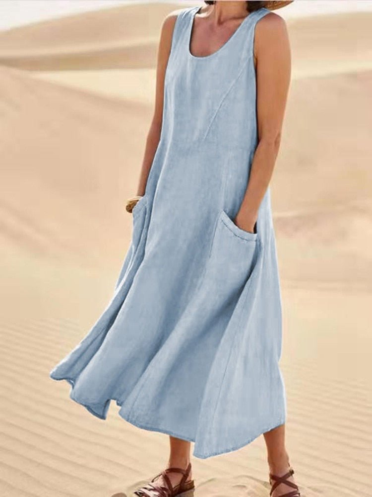 Sleeveless loose-fit midi dress in breathable cotton-linen blend with functional side pockets