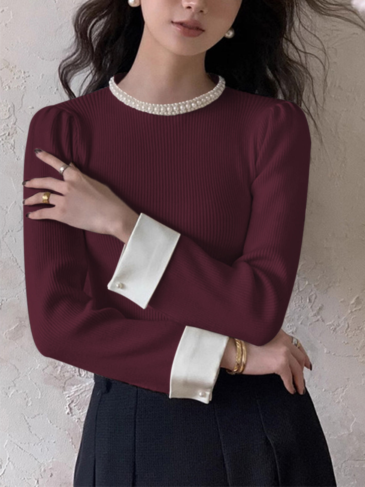 Women's slim knit sweater with pearl detail accents and contrast trim, elegant versatile wardrobe essential