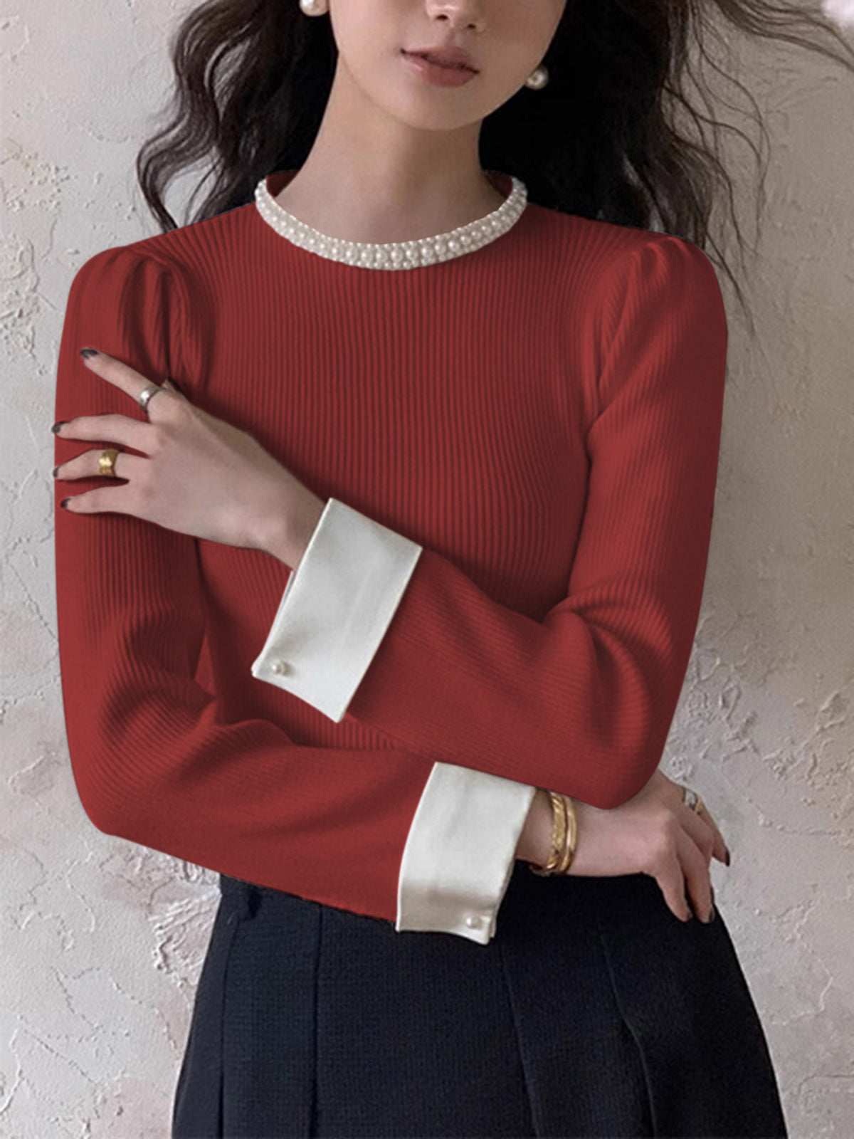 Women's slim knit sweater with pearl detail accents and contrast trim, elegant versatile wardrobe essential