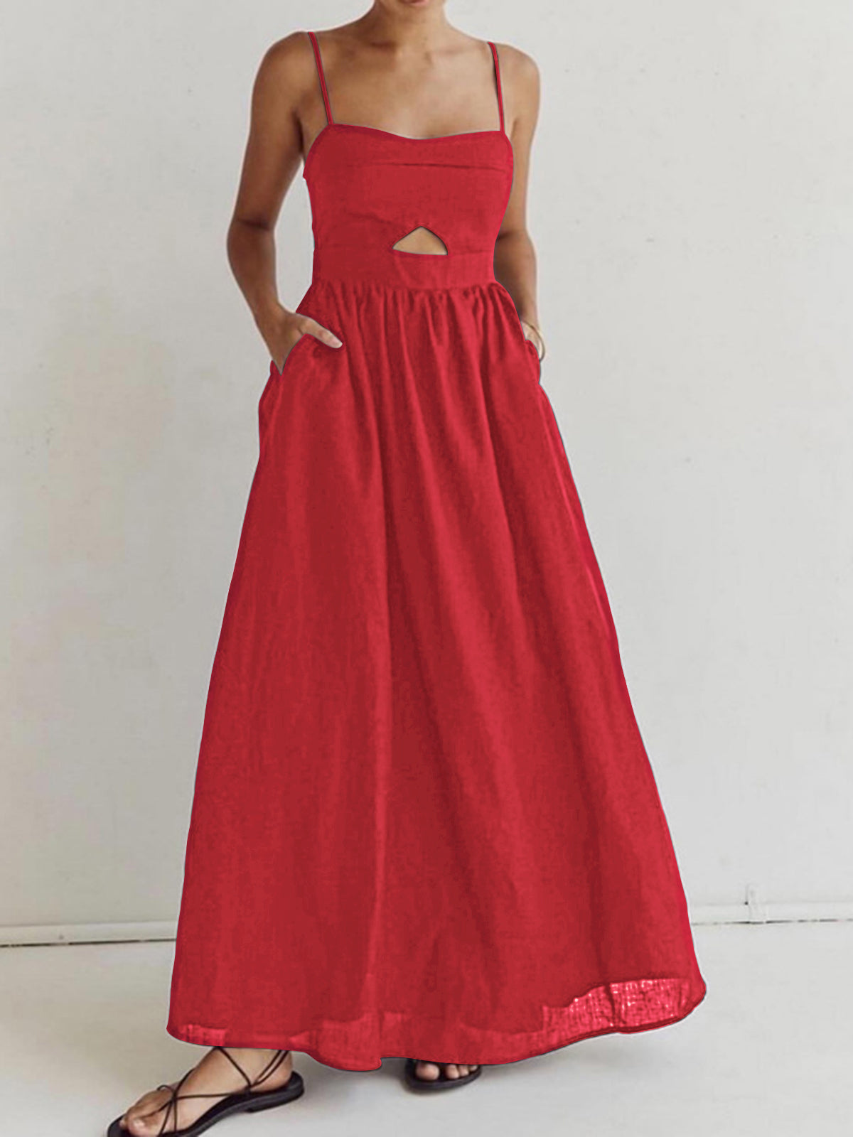 Women's white cotton sleeveless maxi dress with cutout bodice, slim straps, and side pockets