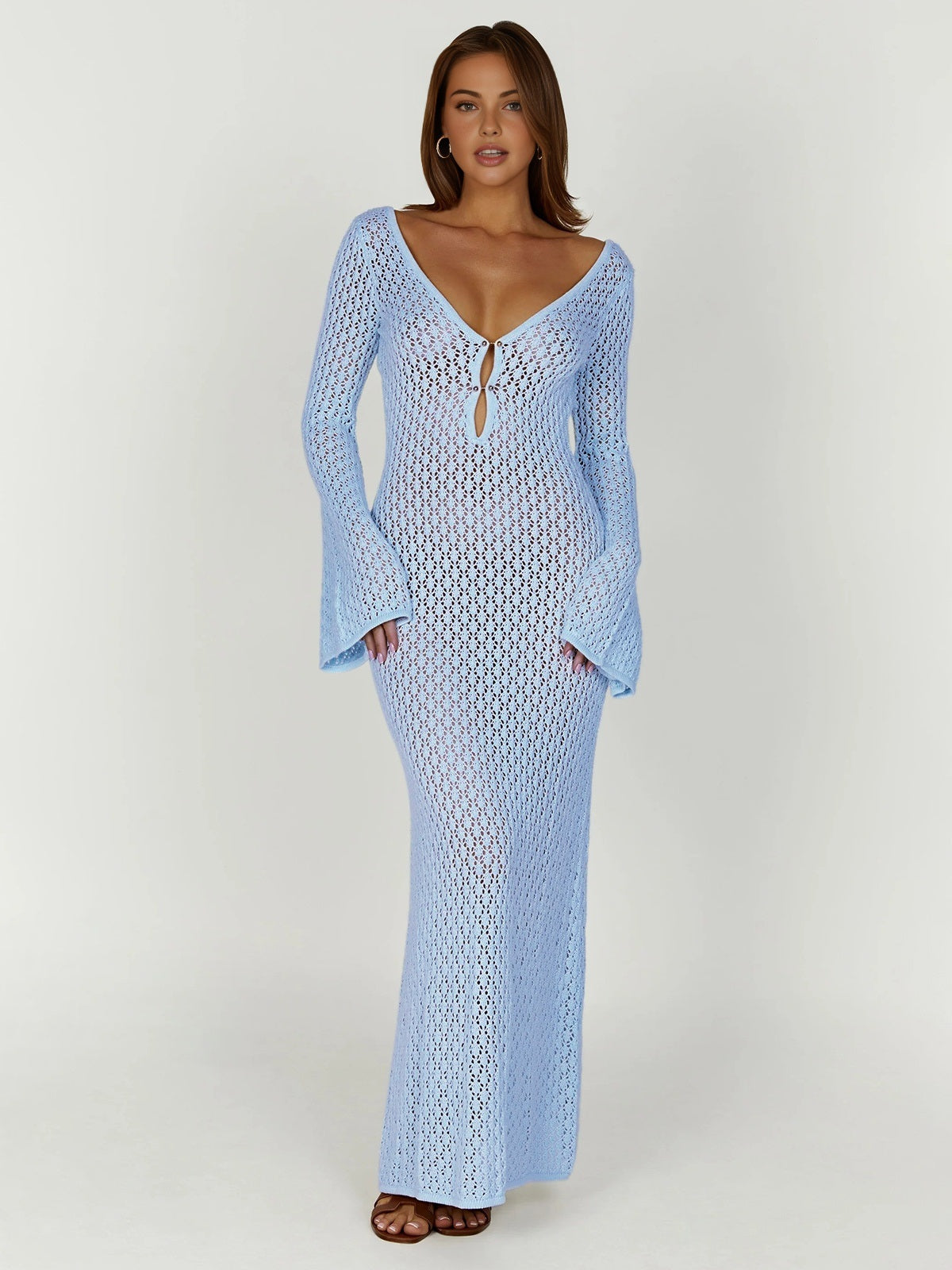 Beige knit maxi cover-up dress with long sleeves and open back for resort wear