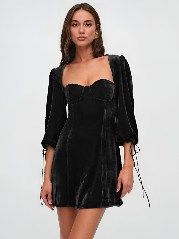 Crimson red velvet mini dress with dramatic puff sleeves, form-fitting silhouette for night out