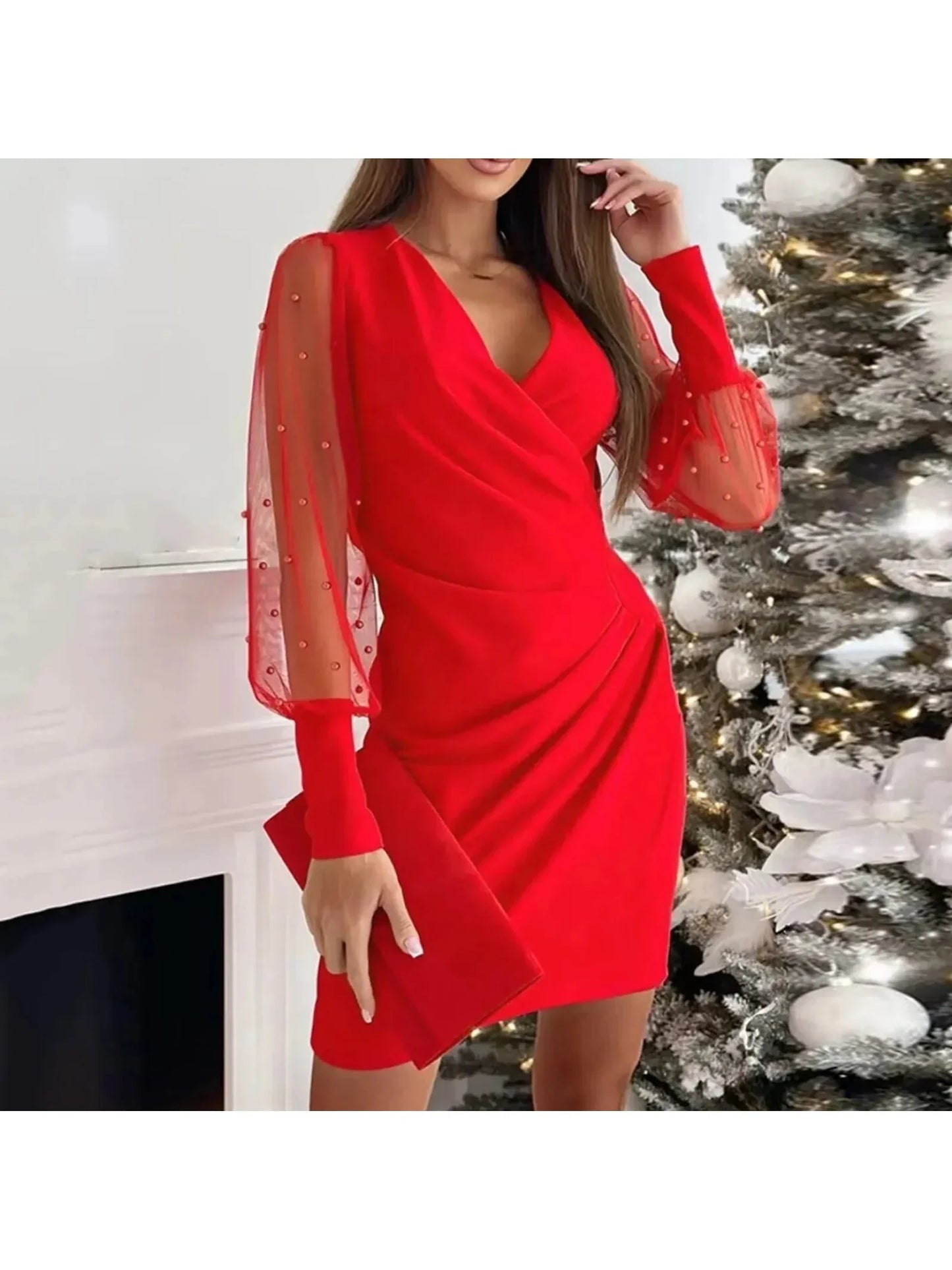 Women's elegant wrap dress with sparkle detail, flattering silhouette, long sleeves, festive party style